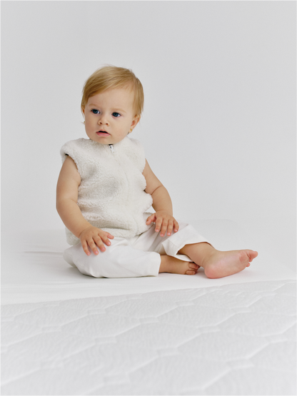 Камізелька хутряна Молочна